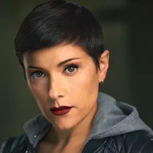 Dark short haired woman with deep red lipstick