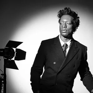 tall, dark, handsome man poses in this old fashioned photo shoot