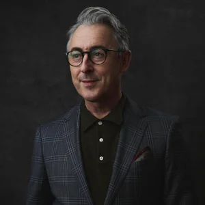 Portrait of Alan Cumming in a suit