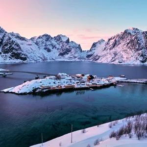 snowy mountains at sunset