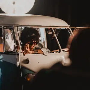 Studio photo shoot with a model in a van