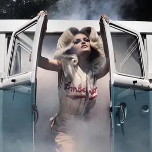 Woman in baseball uniform and blonde wig coming out of a smoky van