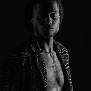 Model in black and white with dramatic lighting