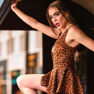 Model in a leopard print dress